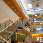 multi-level atrium with windows, walkways, dramatic stairways and gathering areas
